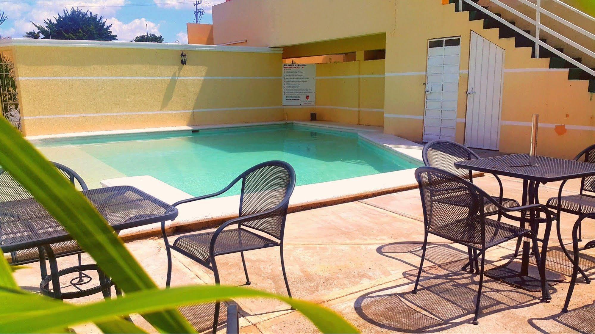 Hotel El Marques Merida Bagian luar foto